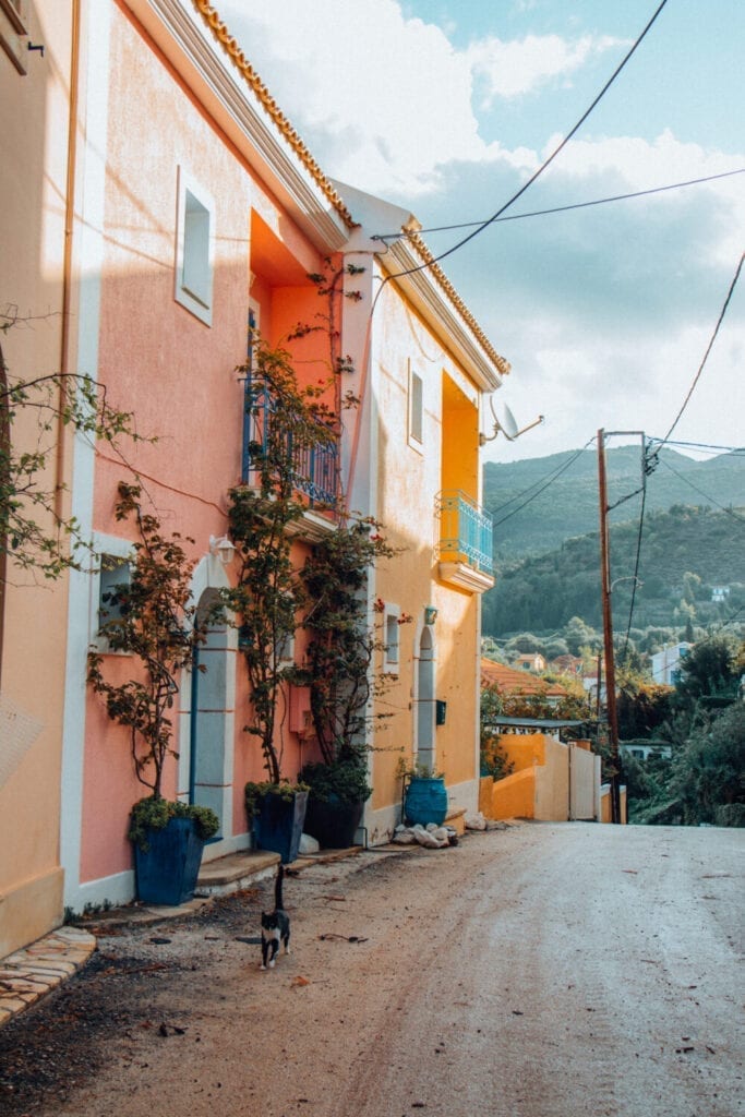 things to do in Kefalonia, Assos road with Colourful houses.