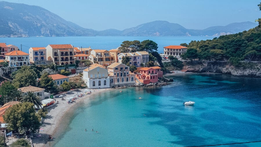 Assos town and beach, bright blue sea and beautiful houses on Cephalonia, Greek Island. 